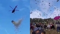 Šovu zvaigzne no helikoptera izmet vienu miljonu dolāru un izraisa haosu