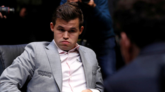 Карлсен выиграл вторую партию тай-брейка в матче за шахматную корону